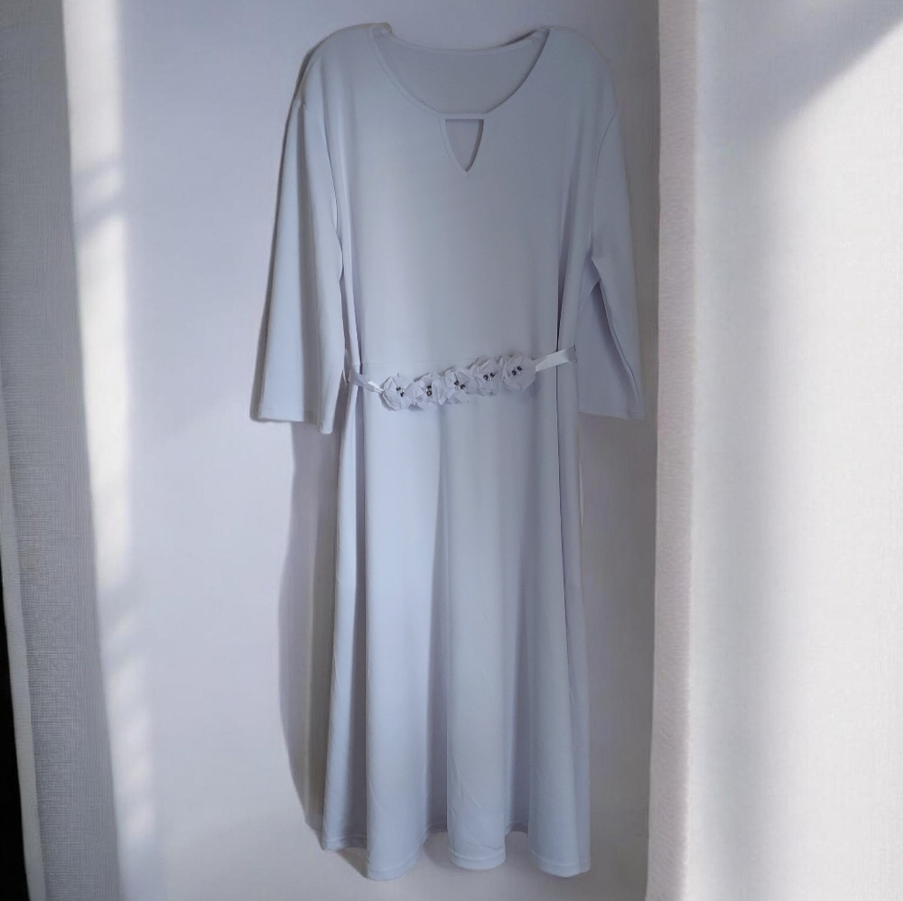 Chic White Long Sleeve Dress with Floral Accent